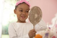 Child Looking in a Mirror