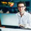 Young man in front of laptop