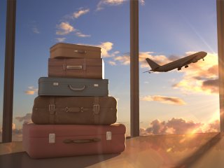 Suitcases in an airport window